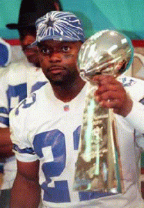 Emmitt Smith, one of the greatest football players of all time, with the Lombardi Trophy.